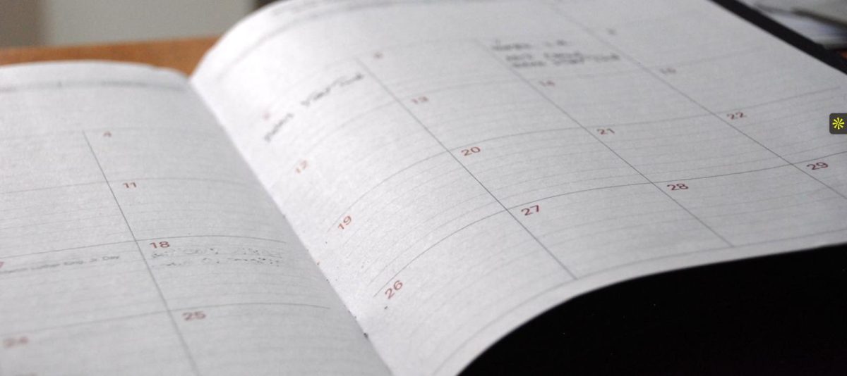 Open calendar planner representing a slow legal hiring timeline for a law firm search