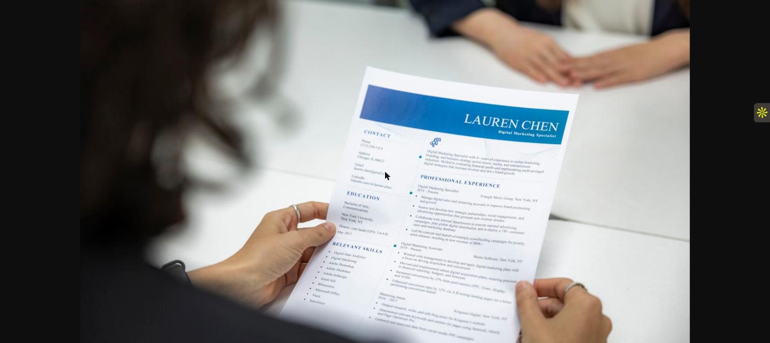 Legal employer reviewing a resume while screening qualified legal candidates