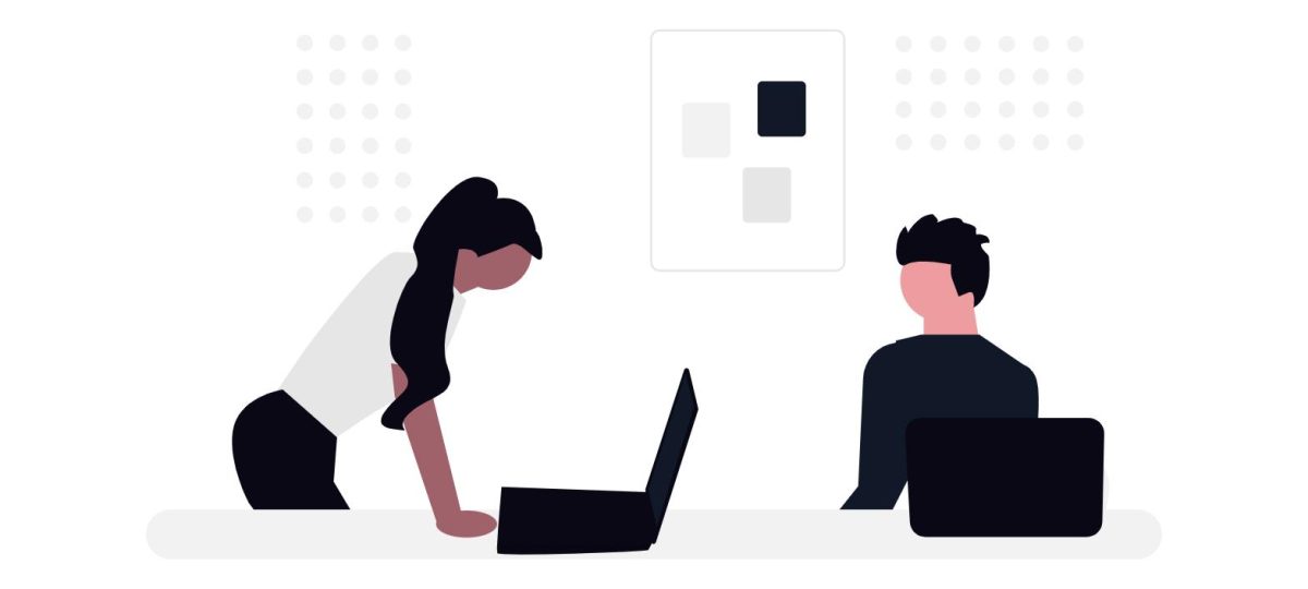 Illustration of two colleagues working together, representing temporary legal staffing for law firms